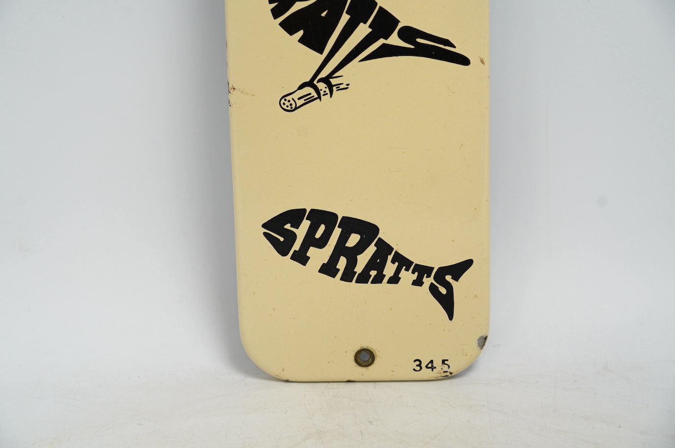 A vintage Spratt's dog, cat, budgerigar and fish enamel advertising sign, 13cm wide, 61cm high. Condition - fair